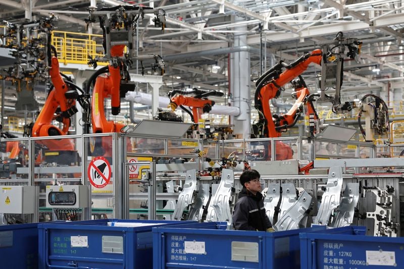 China’s factory activity returns to growth in September amid AI boom