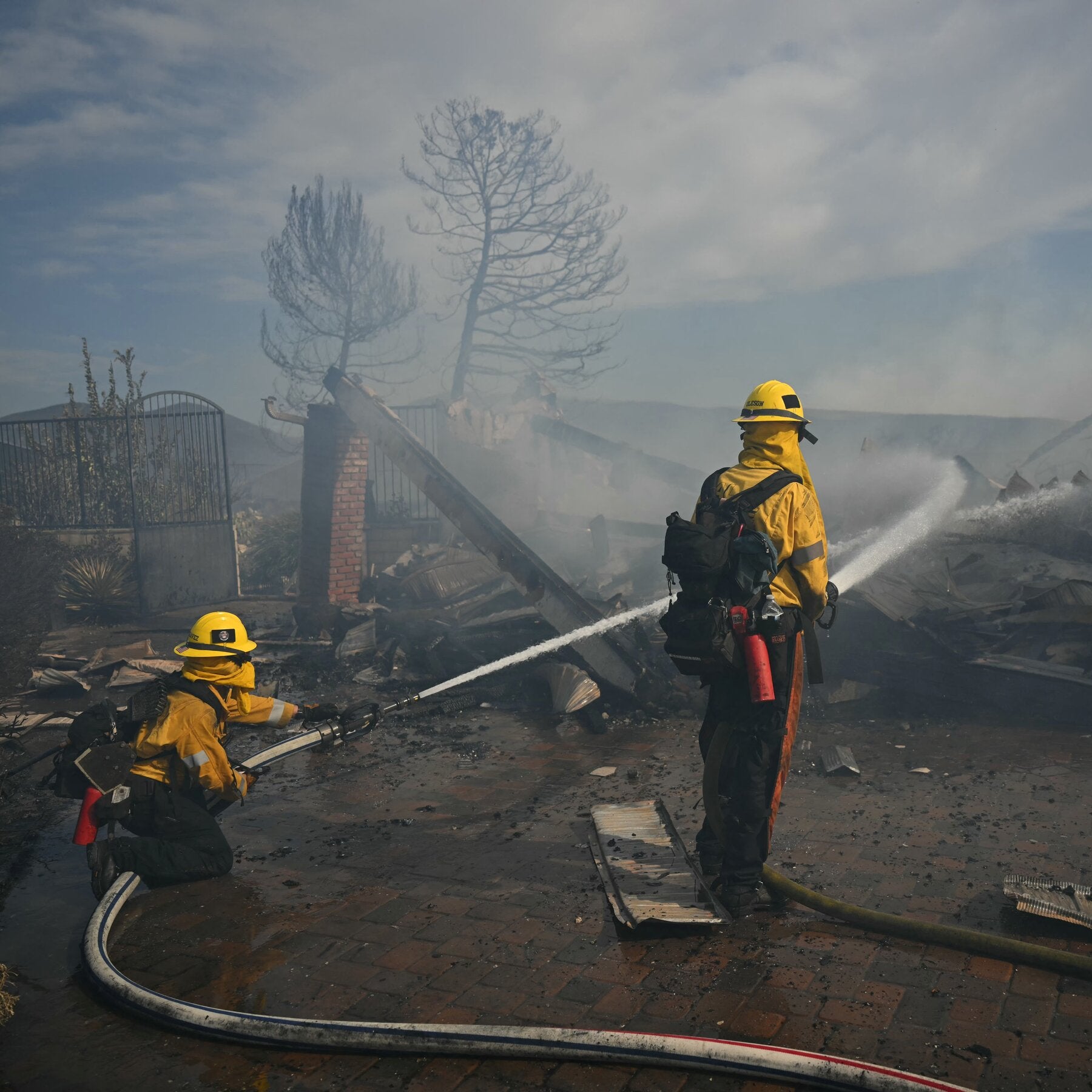 Firefighters Race to Control California Wildfires as Winds Threaten to Spark More